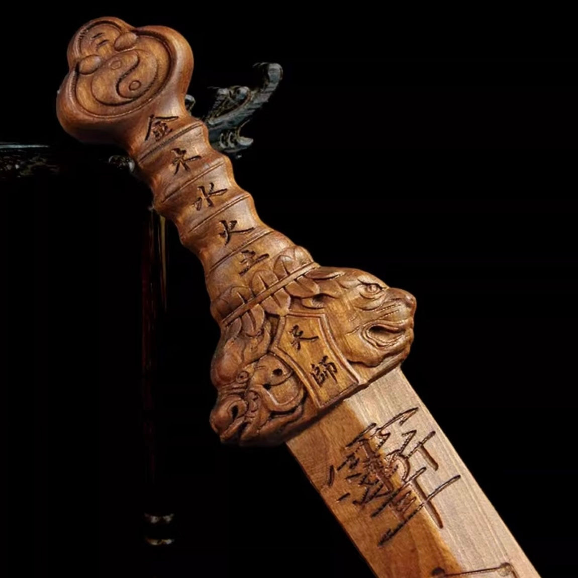 Handcrafted peach wood Taoist sword for feng shui decor and cultural display
